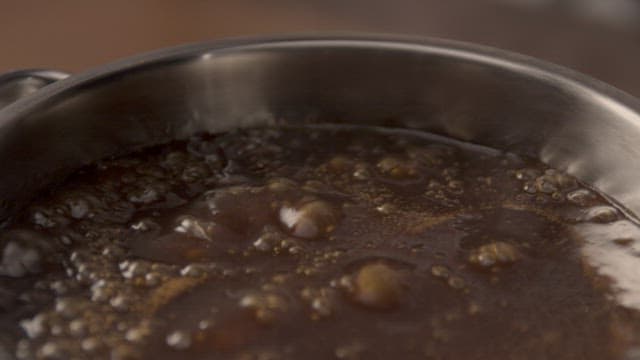 Stirring Boiling Sauce with a Spatula