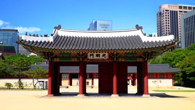 Gate of Deoksugung Palace showing traditional Korean architecture on a sunny day