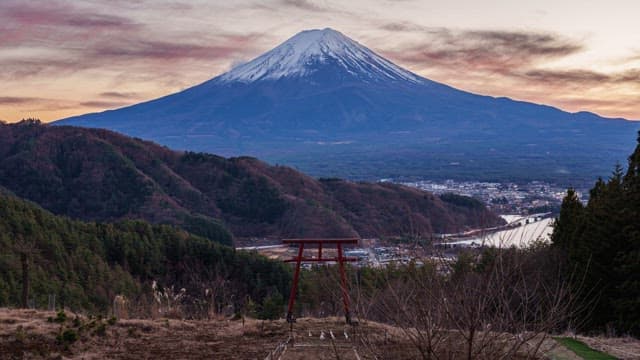 Mount Fuji with a torii gate at sunset