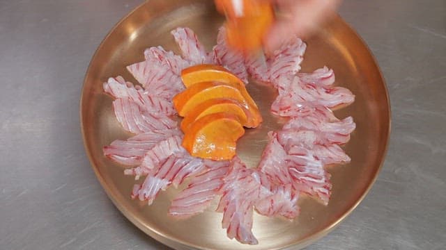 Fresh sashimi and liver of tingray and fish on a plate