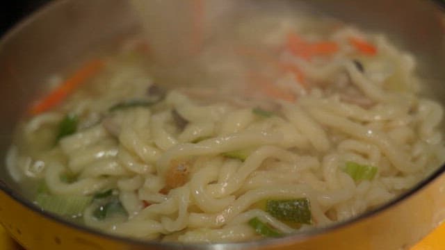 Kalguksu with vegetables in broth