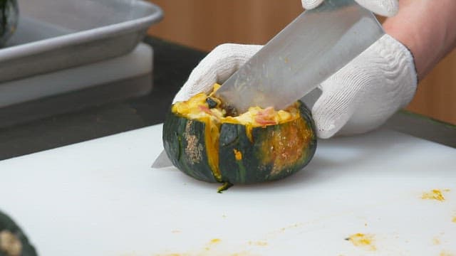 Cutting the Steaming Pumpkin Gratin