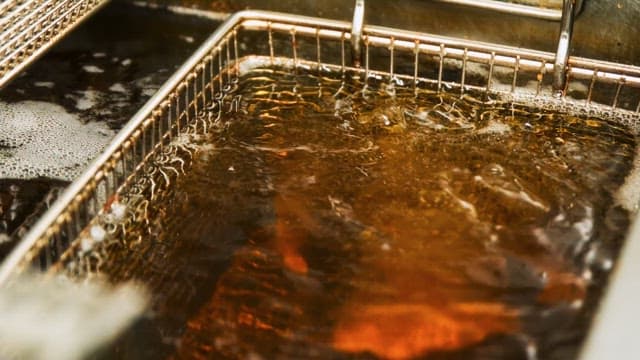 Deep Fryer in Action at a Kitchen in Restaurant