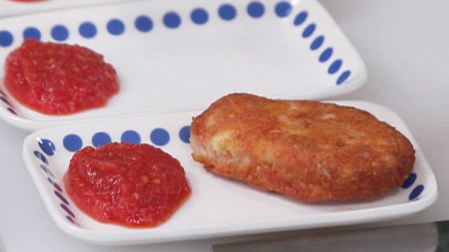 Potato Pancakes Placed on a Plate with Ketchup