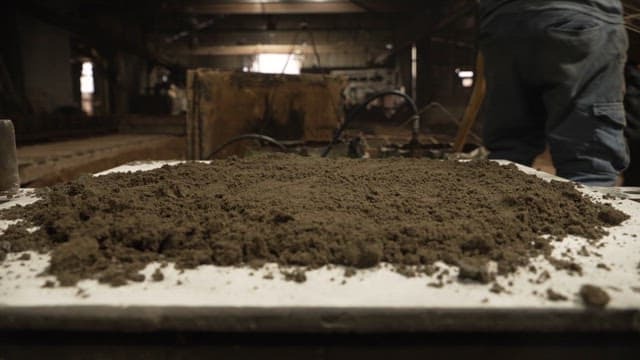 Workers bringing metal frames