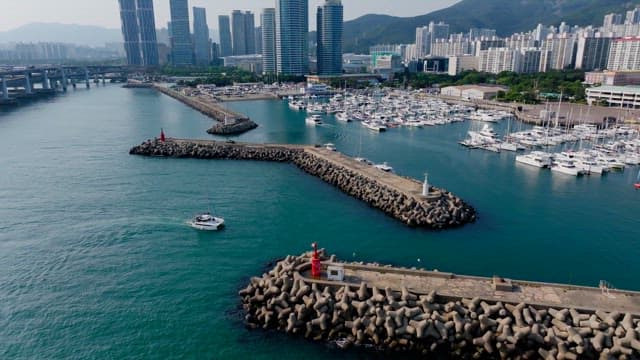 Busan's coastline with skyscrapers, and yacht marinas