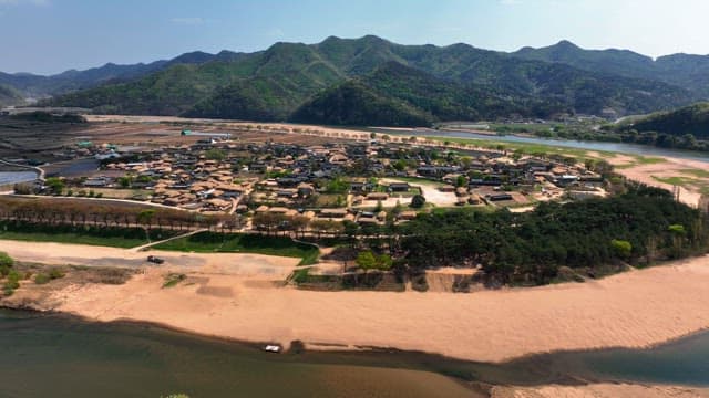 Traditional village surrounded by mountains