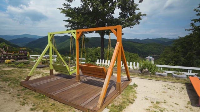 Serene Mountain View with Rustic Swing