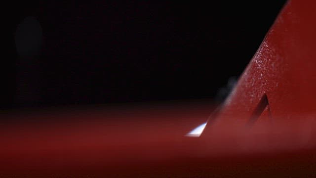 Fingers Tapping Happily on a red Table