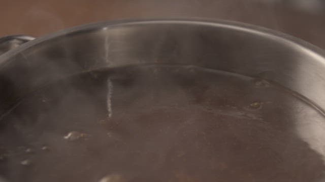 Boiling Red Bean Soup in a Steel Pot