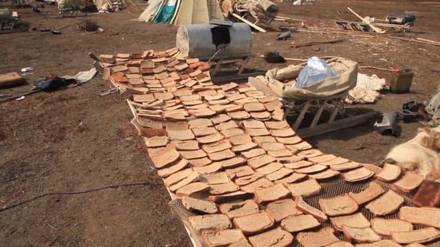 Traditional Bread Making in Outdoor Setting