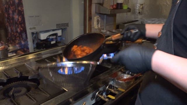 Chicken feet grilled over direct fire