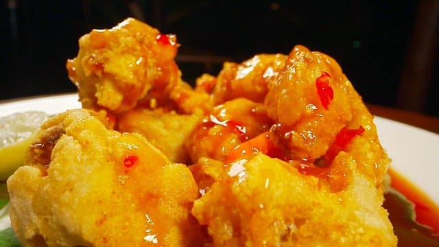 Delicious fried fish with thick sauce