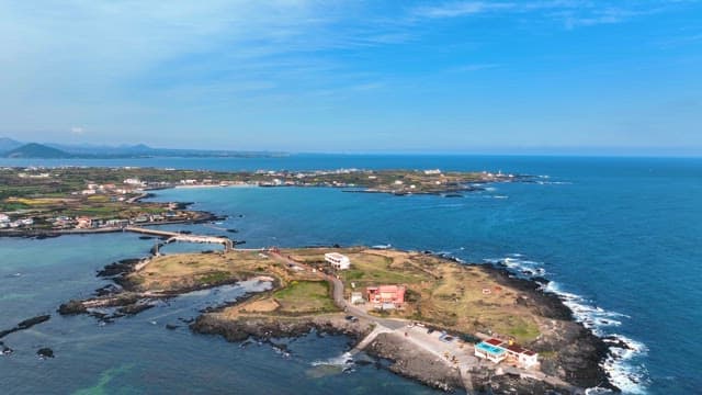 Coastal village with clear blue sea