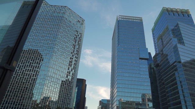 Skyscrapers Reaching Towards a Blue Sky