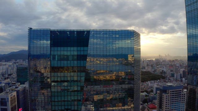 City skyline with modern skyscrapers at sunset