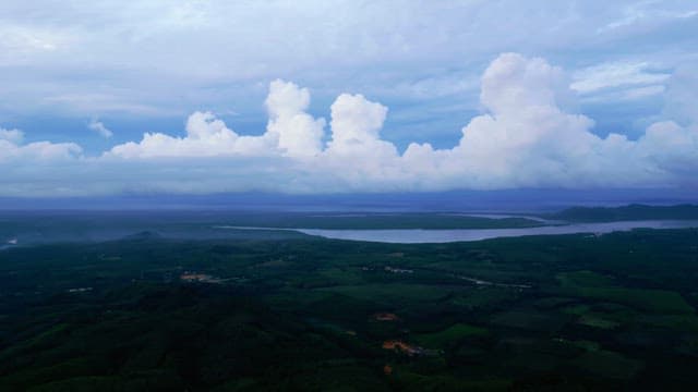 Expansive landscape with clouds and river