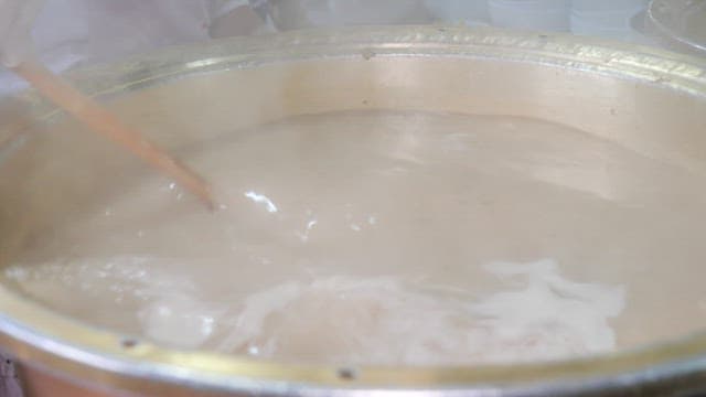 Boiling noodles in a large pot of boiling water