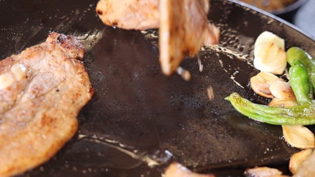 Samgyeopsal Being Grilled on a Hot Pan