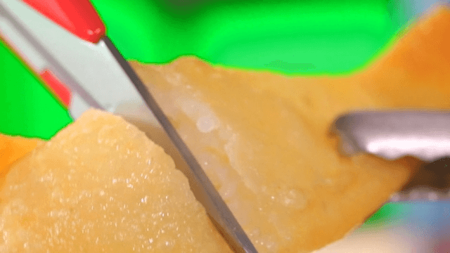 Cutting Crispy Dumplings with Scissors