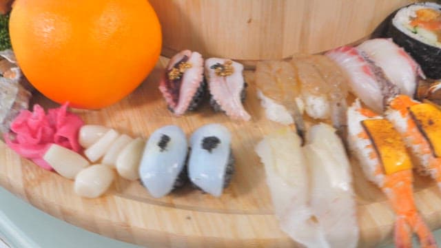 Assorted Sushi Platter on Wooden Board