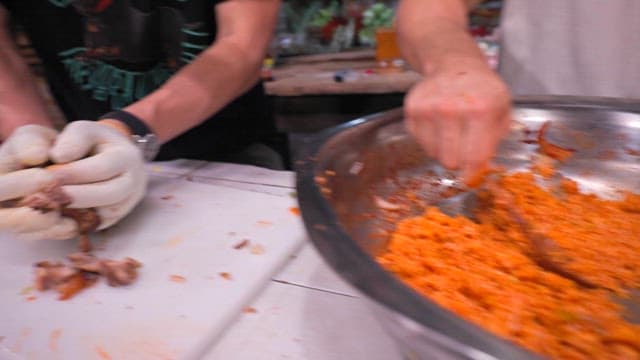 Mixing pig trotters and julienne Korean radish salad bibimbap