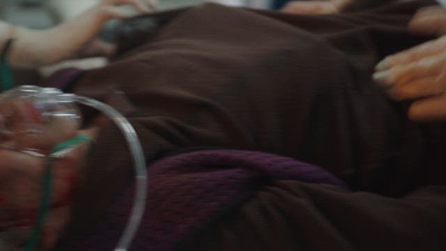 Medical Staff Performing a Checkup on a Patient