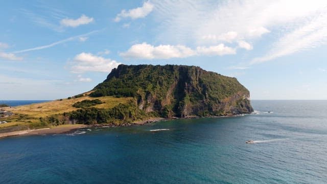 Scenic island with lush greenery and ocean