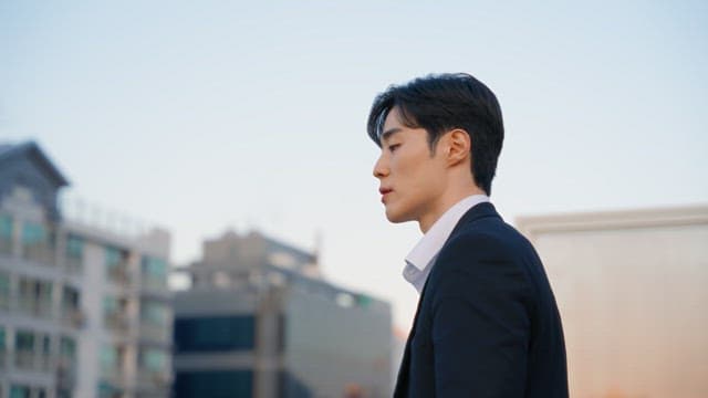 Man sighs on the rooftop