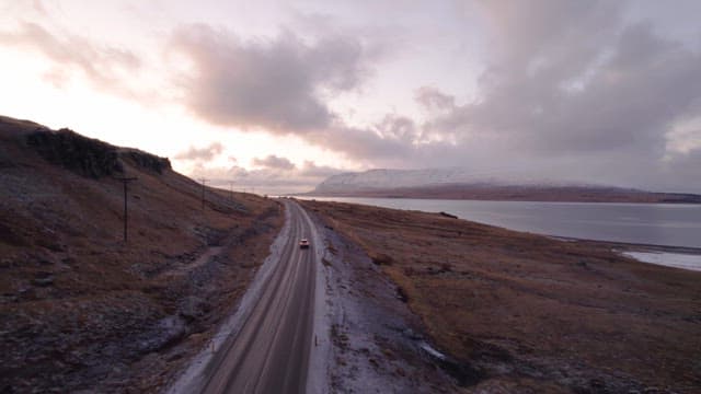 Car driving on a scenic coastal road