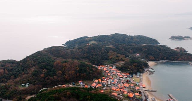 Autumn-Colored Mountains and Coastal Villages