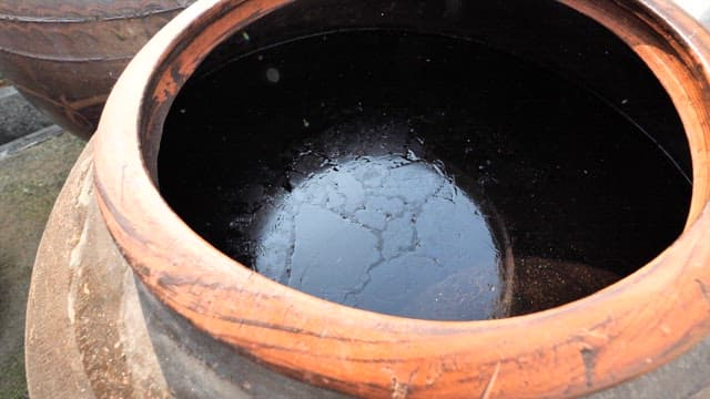 Fermented Soy Sauce in a Crock, the Traditional Jar