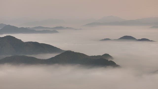 Misty Mountain Peaks at Dawn