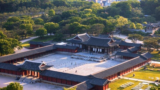 View of a historic palace in evening light transitioning to night