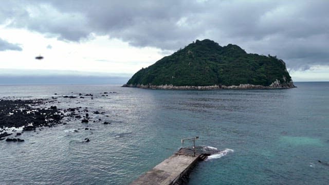 Tranquil island surrounded by the sea
