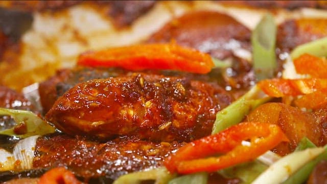 Braised fish and radish boiling in a pot