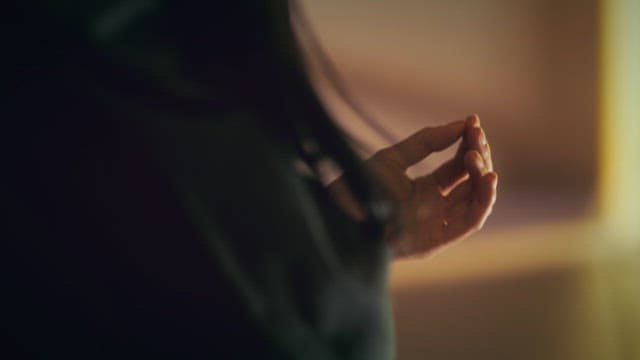 Woman Lost in Thought While Fiddling with Her Nails