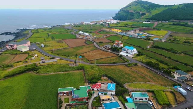 Udo, a beautiful island with a coastal village and green farmland