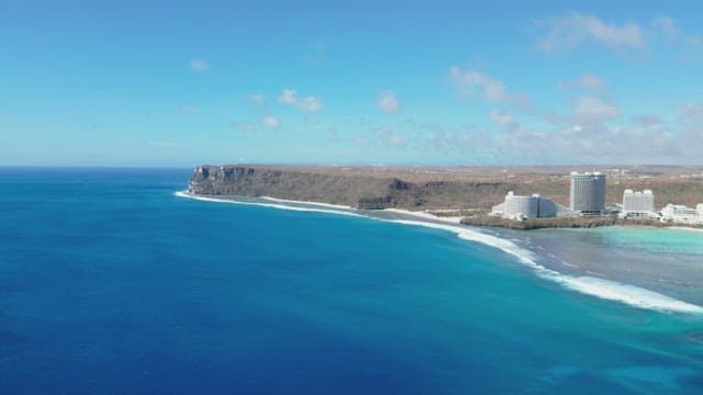 Coastal city with clear blue ocean