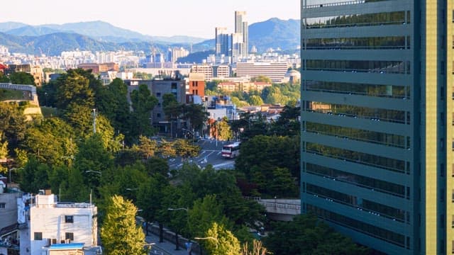 Cityscape and traffic transitioning from day to night