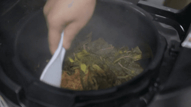 Spinach and rice cooked in an electric pressure cooker