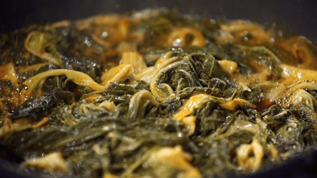 Napa cabbage boiling in a pot