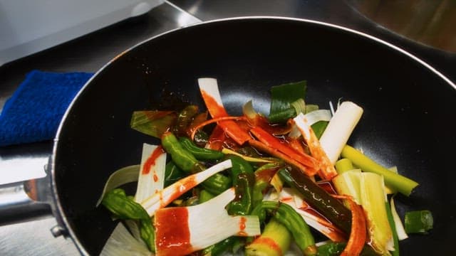 Fresh vegetables stir-frying in a pan