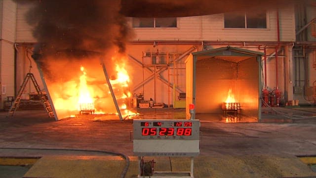 Fire test at an industrial facility with safety equipment