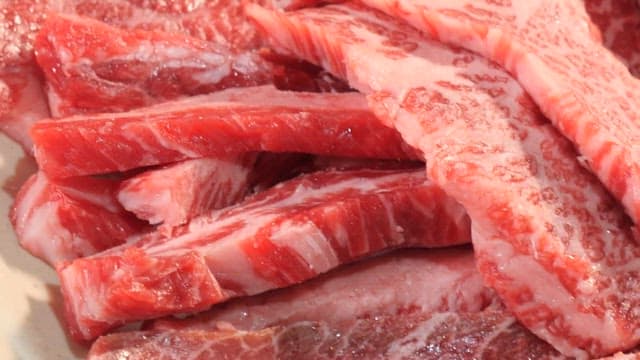 Succulent Raw Marbled Meat Slices