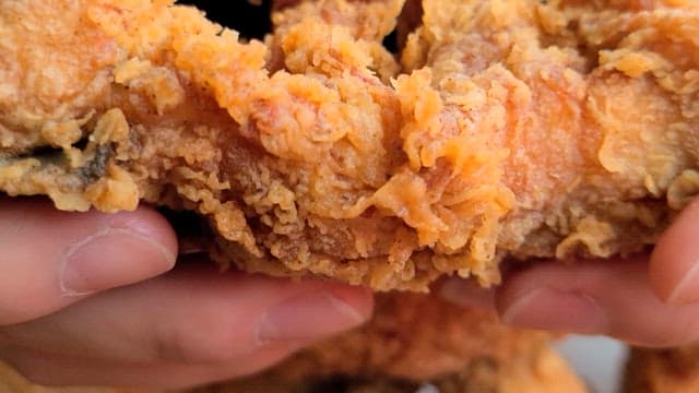 Crispy, golden brown fried chicken flesh