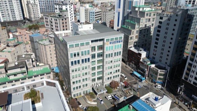 Exterior of a Police Station in a City with Dense Buildings