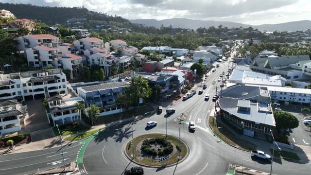 Aerial view of a city with buildings and roads