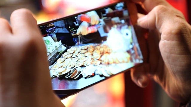 Filming Street Food Preparation on Smartphone