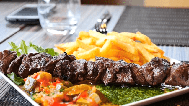 Delicious steak plate with fries.